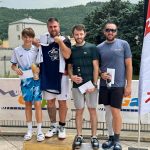 Rencontre de double hommes pendant le tournoi Volant des Alpes à Gap, avec deux joueurs du club de Valserhône sur le podium, à la première place.